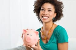 young woman with piggy bank