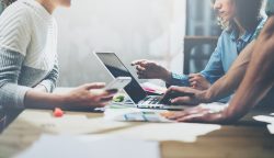business people using electronic devices