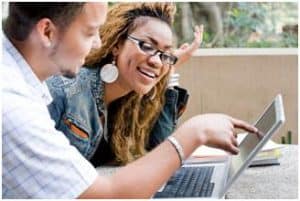 Students using a laptop