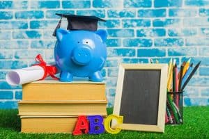 piggy bank on a stack of books