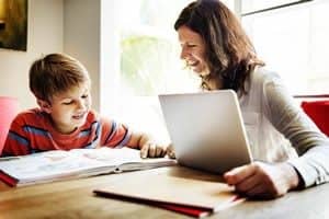 Parent helping child with homework