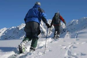 two people snowshoeing in winter