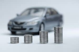 coin stacks in front of car