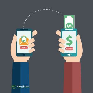 2 hands holding phones showing money transfer