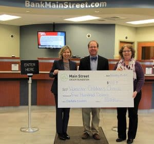 Main Street Group Foundation presents $500 donation to Worcester Children's Chorus