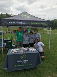 Main Street Bank employees under tent at Relay for Life in Marlborough