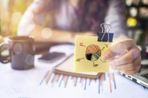 Woman analyzing market data in meeting room.