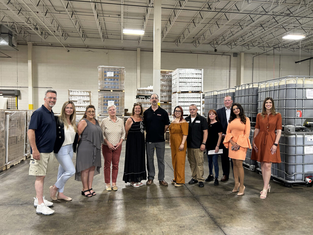 Business banking partner and employees from Hi-Gear Products in one of the company's manufacturing facilities in Leominster, MA.